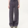 Leichte Leinenhose mit Umschlag und Voyage Imaginaire-Print Leichte Leinenhose mit Umschlag und Voyage Imaginaire-Print