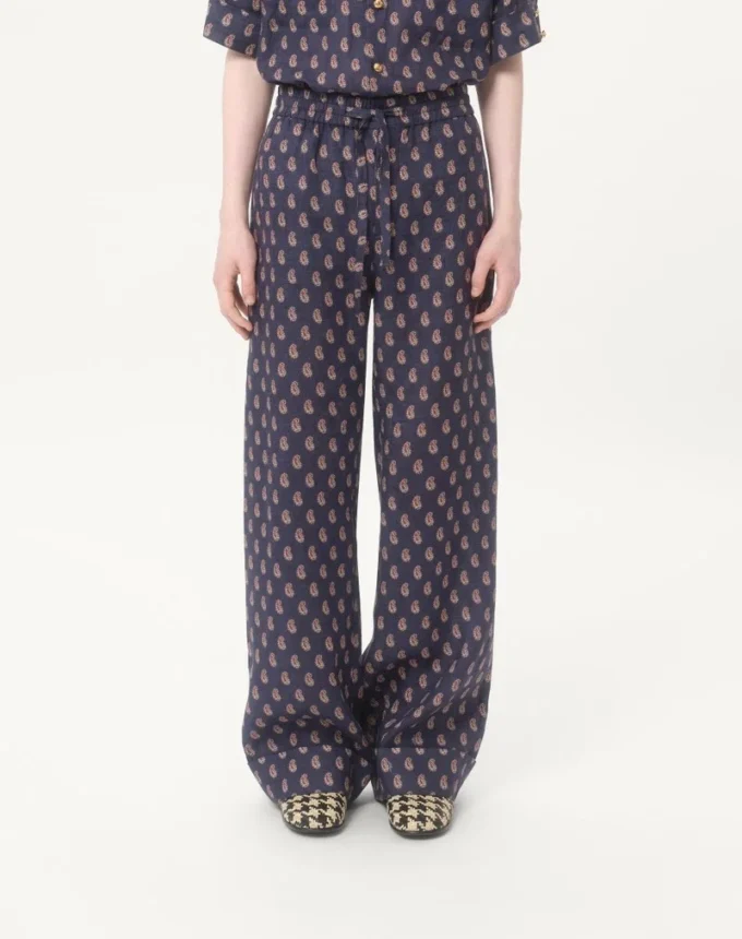 Leichte Leinenhose mit Umschlag und Voyage Imaginaire-Print Leichte Leinenhose mit Umschlag und Voyage Imaginaire-Print