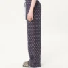 Leichte Leinenhose mit Umschlag und Voyage Imaginaire-Print Leichte Leinenhose mit Umschlag und Voyage Imaginaire-Print