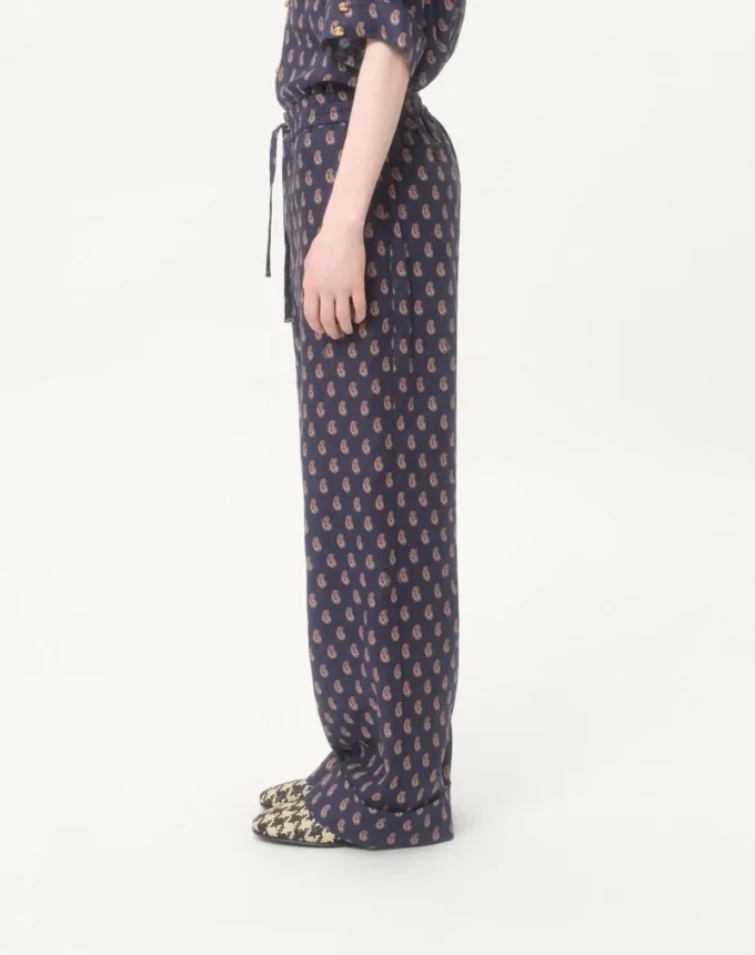 Leichte Leinenhose mit Umschlag und Voyage Imaginaire-Print Leichte Leinenhose mit Umschlag und Voyage Imaginaire-Print