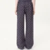 Leichte Leinenhose mit Umschlag und Voyage Imaginaire-Print Leichte Leinenhose mit Umschlag und Voyage Imaginaire-Print