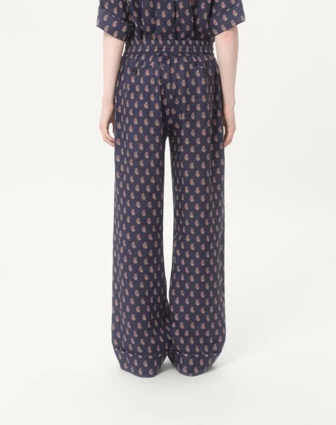 Leichte Leinenhose mit Umschlag und Voyage Imaginaire-Print Leichte Leinenhose mit Umschlag und Voyage Imaginaire-Print