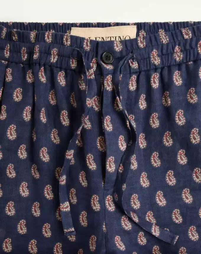 Leichte Leinenhose mit Umschlag und Voyage Imaginaire-Print Leichte Leinenhose mit Umschlag und Voyage Imaginaire-Print