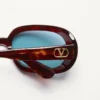 Ovale Wrap-Around-Brille aus Acetat Ovale Wrap-Around-Brille aus Acetat