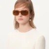 Rechteckige Acetatbrille im Stil der 70er Jahre Rechteckige Acetatbrille im Stil der 70er Jahre