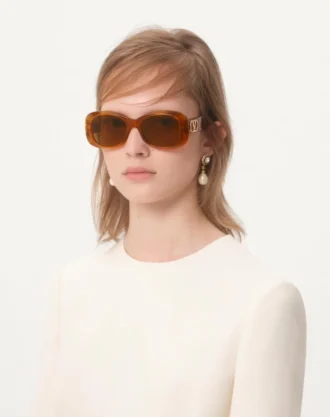 Rechteckige Acetatbrille im Stil der 70er Jahre