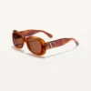 Rechteckige Acetatbrille im Stil der 70er Jahre Rechteckige Acetatbrille im Stil der 70er Jahre