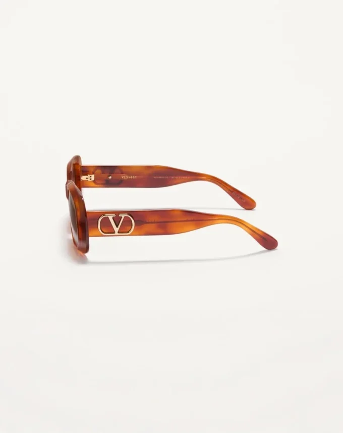 Rechteckige Acetatbrille im Stil der 70er Jahre Rechteckige Acetatbrille im Stil der 70er Jahre