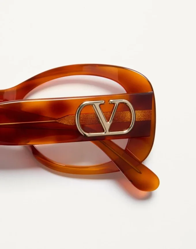 Rechteckige Acetatbrille im Stil der 70er Jahre Rechteckige Acetatbrille im Stil der 70er Jahre