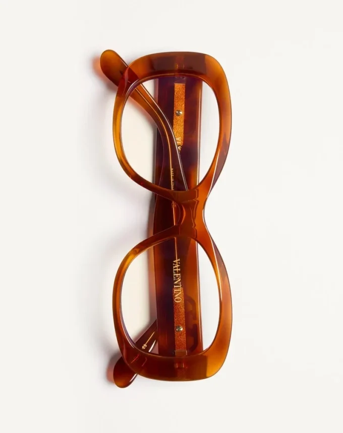 Rechteckige Acetatbrille im Stil der 70er Jahre Rechteckige Acetatbrille im Stil der 70er Jahre