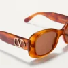 Rechteckige Acetatbrille im Stil der 70er Jahre Rechteckige Acetatbrille im Stil der 70er Jahre