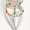 Rockstud Décolleté aus laminiertem Nappaleder mit Cabochon und Kristallen 100 mm Rockstud Décolleté aus laminiertem Nappaleder mit Cabochon und Kristallen 100 mm