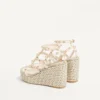 Rockstud Keilsandaletten aus Kalbsleder mit Riemchen 95 mm Rockstud Keilsandaletten aus Kalbsleder mit Riemchen 95 mm