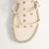 Rockstud Keilsandaletten aus Kalbsleder mit Riemchen 95 mm Rockstud Keilsandaletten aus Kalbsleder mit Riemchen 95 mm