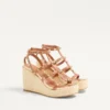 Rockstud Keilsandaletten mit Riemchen aus Kalbsleder 95 mm Rockstud Keilsandaletten mit Riemchen aus Kalbsleder 95 mm