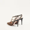 Rockstud Pumps mit Riemchen aus Kalbsleder in Pony-Optik 100 mm Rockstud Pumps mit Riemchen aus Kalbsleder in Pony-Optik 100 mm