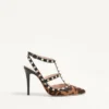 Rockstud Pumps mit Riemchen aus Kalbsleder in Pony-Optik 100 mm Rockstud Pumps mit Riemchen aus Kalbsleder in Pony-Optik 100 mm