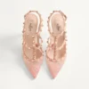 Rockstud-Pumps mit Riemchen und 100-mm-Absatz