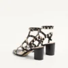 Rockstud-Sandalen aus Kalbsleder mit Fesselriemchen und 60-mm-Absatz