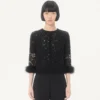 Strickjacke aus Spitze und Baumwolle Strickjacke aus Spitze und Baumwolle