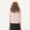 Strickjacke mit Lammfellkragen Strickjacke mit Lammfellkragen