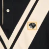 Valentino Baumwoll-Polo mit eingearbeitetem V und gesticktem Panther-Aufnäher Valentino Baumwoll-Polo mit eingearbeitetem V und gesticktem Panther-Aufnäher