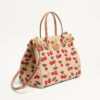 Valentino Garavani Antibes Medium Shopping Bag aus Jacquard-Raffia mit Cherryfic-Motiv Valentino Garavani Antibes Medium Shopping Bag aus Jacquard-Raffia mit Cherryfic-Motiv