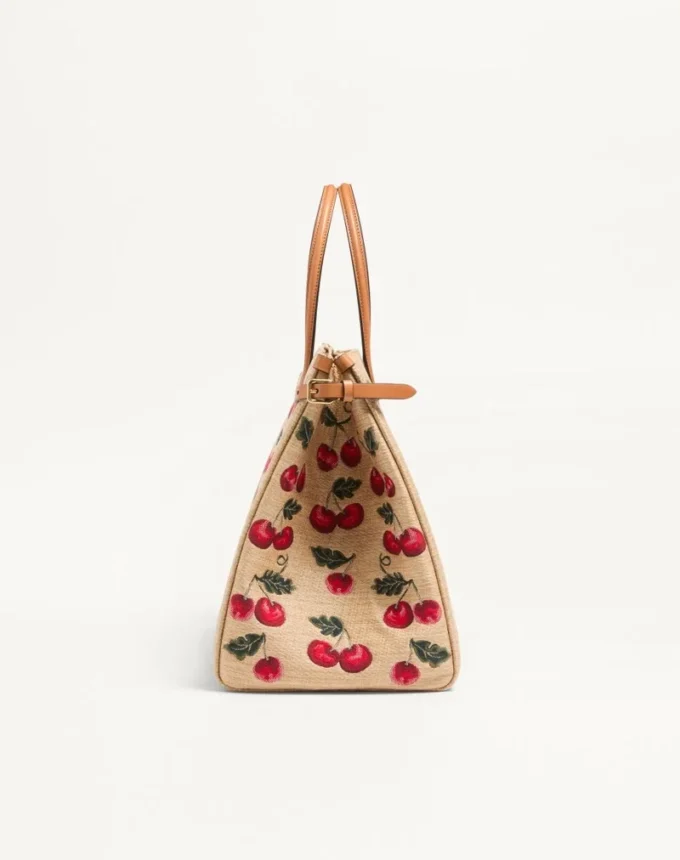 Valentino Garavani Antibes Medium Shopping Bag aus Jacquard-Raffia mit Cherryfic-Motiv Valentino Garavani Antibes Medium Shopping Bag aus Jacquard-Raffia mit Cherryfic-Motiv