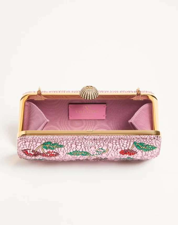 Valentino Garavani Carry Secrets Minaudiere mit Cherryfic-Strassmotiv Valentino Garavani Carry Secrets Minaudiere mit Cherryfic-Strassmotiv