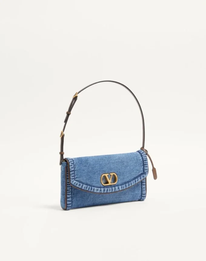 Valentino Garavani DeVain Kleine Denim-Umhängetasche Valentino Garavani DeVain Kleine Denim-Umhängetasche