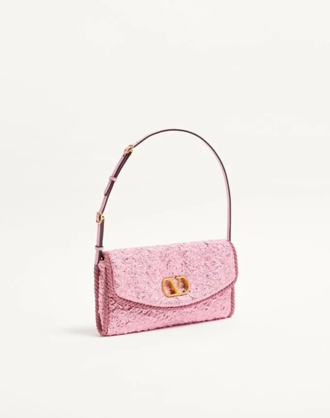 Valentino Garavani DeVain Kleine Umhängetasche aus Cloqué-Jacquard-Stoff. Valentino Garavani DeVain Kleine Umhängetasche aus Cloqué-Jacquard-Stoff.