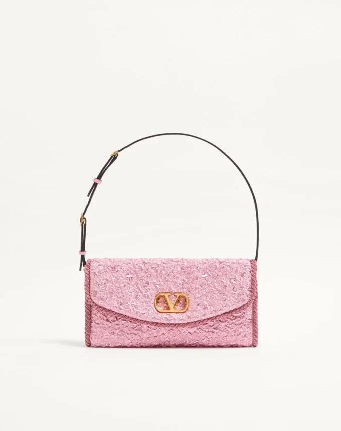 Valentino Garavani DeVain Kleine Umhängetasche aus Cloqué-Jacquard-Stoff. Valentino Garavani DeVain Kleine Umhängetasche aus Cloqué-Jacquard-Stoff.