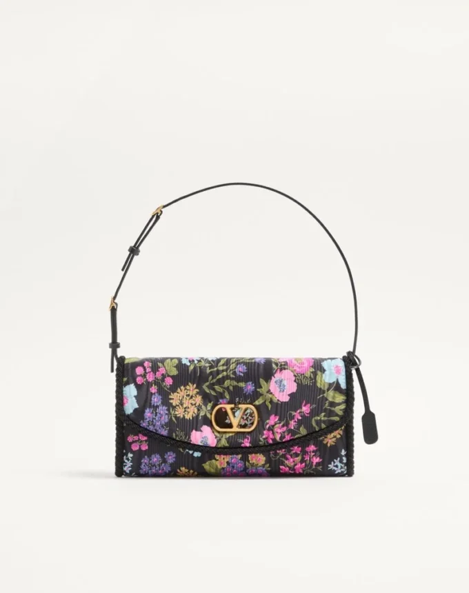 Valentino Garavani DeVain Kleine Umhängetasche aus Moiré-Papier mit Blumenmuster Valentino Garavani DeVain Kleine Umhängetasche aus Moiré-Papier mit Blumenmuster