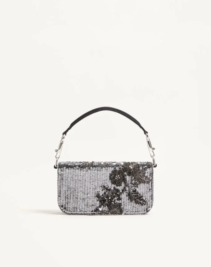 Valentino Garavani Locò Kleine bestickte Umhängetasche mit Juwelenlogo Valentino Garavani Locò Kleine bestickte Umhängetasche mit Juwelenlogo