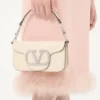 Valentino Garavani Locò Kleine Umhängetasche mit Juwelenlogo Valentino Garavani Locò Kleine Umhängetasche mit Juwelenlogo
