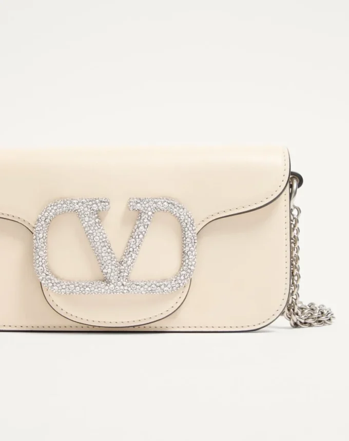 Valentino Garavani Locò Kleine Umhängetasche mit Juwelenlogo Valentino Garavani Locò Kleine Umhängetasche mit Juwelenlogo