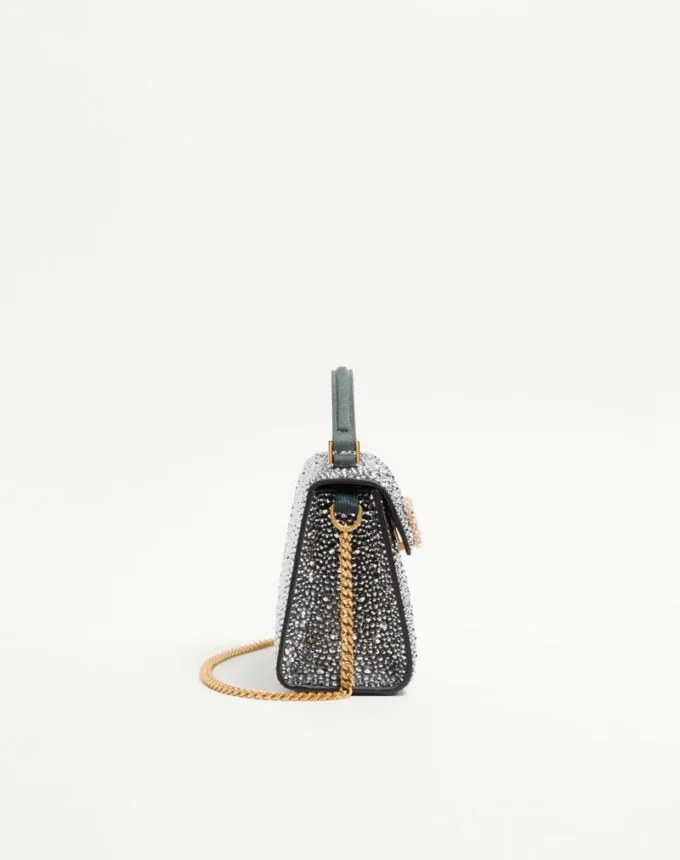Valentino Garavani Mini-Umhängetasche mit Strasssteinen und Juwelenlogo Valentino Garavani Mini-Umhängetasche mit Strasssteinen und Juwelenlogo
