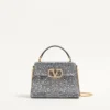 Valentino Garavani Mini-Umhängetasche mit Strasssteinen und Juwelenlogo Valentino Garavani Mini-Umhängetasche mit Strasssteinen und Juwelenlogo