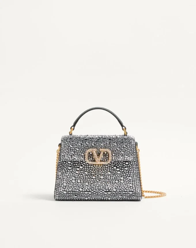 Valentino Garavani Mini-Umhängetasche mit Strasssteinen und Juwelenlogo Valentino Garavani Mini-Umhängetasche mit Strasssteinen und Juwelenlogo