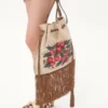 Valentino Garavani Nellcôte Alice bestickte Tasche mit Fransen Valentino Garavani Nellcôte Alice bestickte Tasche mit Fransen