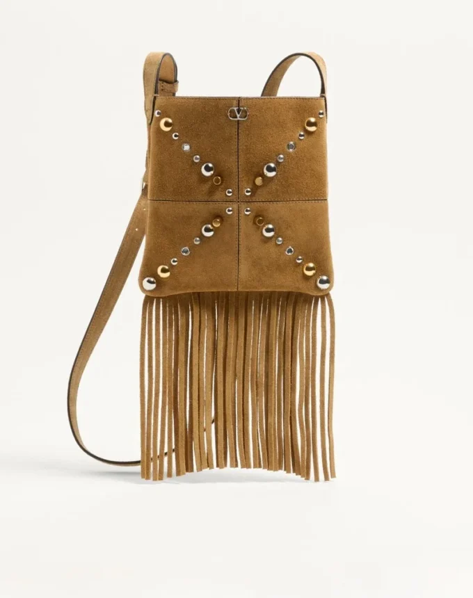 Valentino Garavani Nellcôte Kleine Schultertasche aus Wildleder mit Fransen Valentino Garavani Nellcôte Kleine Schultertasche aus Wildleder mit Fransen