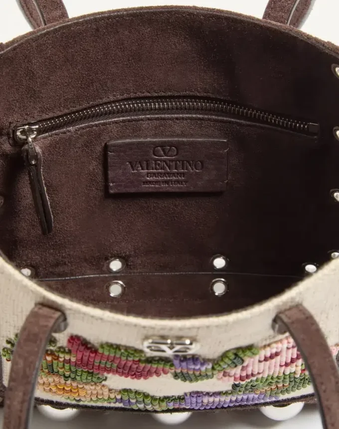 Valentino Garavani Nellcôte Mini-Einkaufstasche mit Stickerei Valentino Garavani Nellcôte Mini-Einkaufstasche mit Stickerei