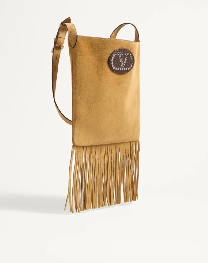 Valentino Garavani Nellcôte Schultertasche aus Wildleder mit Fransen Valentino Garavani Nellcôte Schultertasche aus Wildleder mit Fransen