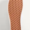 Valentino Garavani und Vans Low-Top-Stoff-Sneaker mit VLogo-Schachbrettmuster und tropischem Blattmuster Valentino Garavani und Vans Low-Top-Stoff-Sneaker mit VLogo-Schachbrettmuster und tropischem Blattmuster