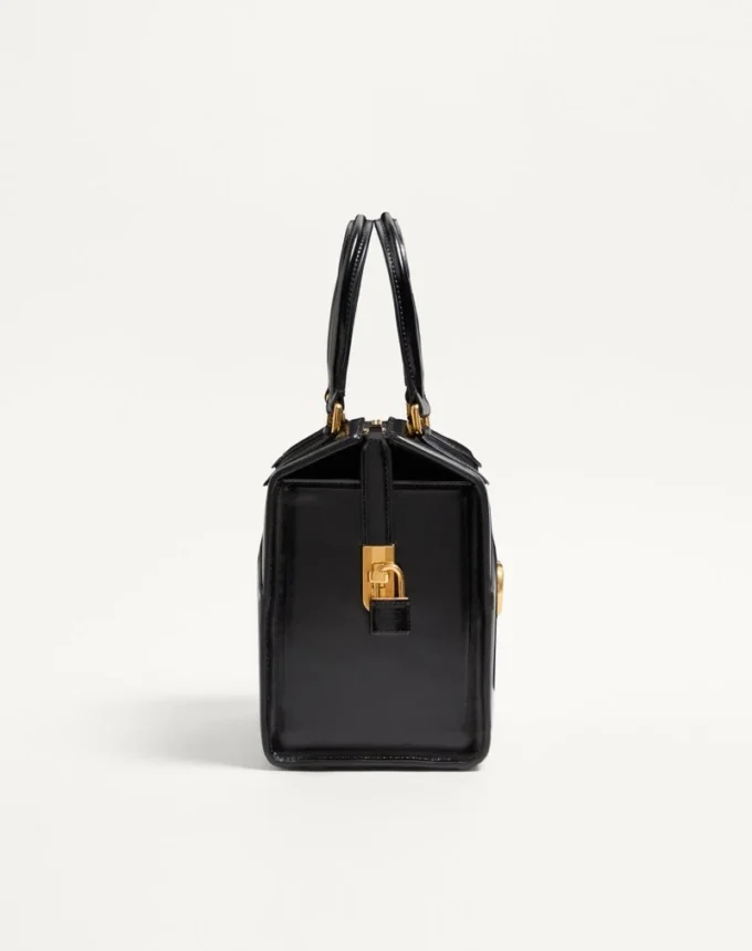 Valentino Garavani Vain-Case Bowlingtasche aus glänzendem Kalbsleder Valentino Garavani Vain-Case Bowlingtasche aus glänzendem Kalbsleder