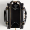 Valentino Garavani Vain-Case Bowlingtasche aus glänzendem Kalbsleder Valentino Garavani Vain-Case Bowlingtasche aus glänzendem Kalbsleder