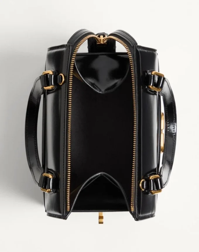 Valentino Garavani Vain-Case Bowlingtasche aus glänzendem Kalbsleder Valentino Garavani Vain-Case Bowlingtasche aus glänzendem Kalbsleder
