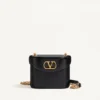 Valentino Garavani Vain Kosmetiktasche aus glänzendem Kalbsleder Valentino Garavani Vain Kosmetiktasche aus glänzendem Kalbsleder