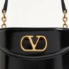 Valentino Garavani Vain Kosmetiktasche aus glänzendem Kalbsleder Valentino Garavani Vain Kosmetiktasche aus glänzendem Kalbsleder