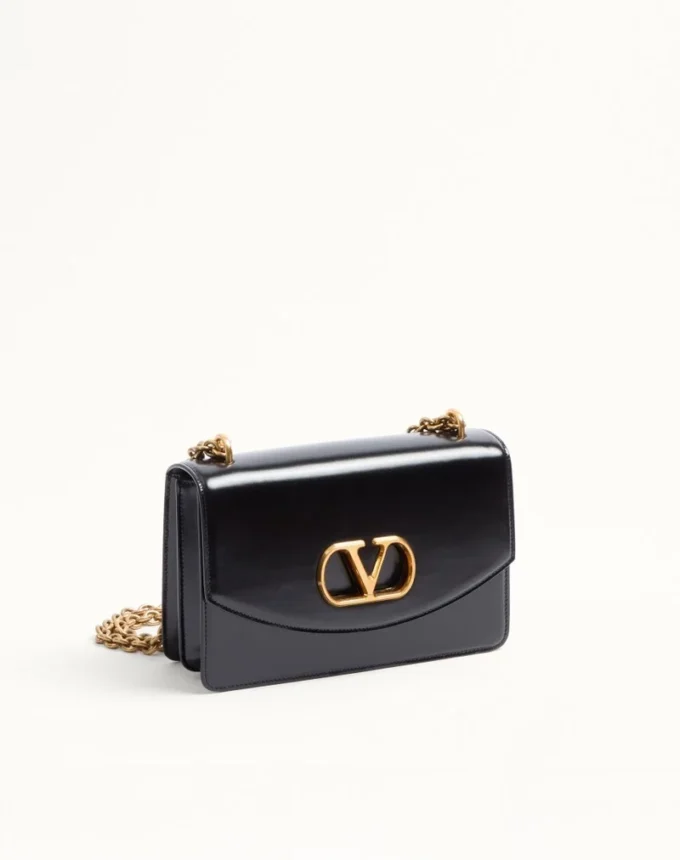Valentino Garavani Vain Schultertasche aus glänzendem Kalbsleder Valentino Garavani Vain Schultertasche aus glänzendem Kalbsleder